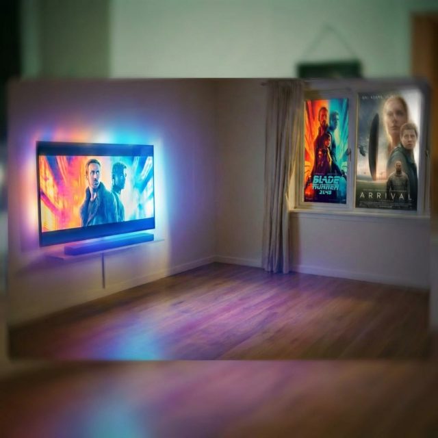 Backlit TV showing Blade Runner 2049 beside posters for Arrival and Blade Runner 2049.